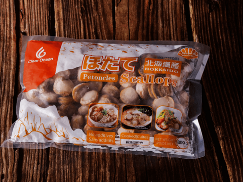 Clear Ocean Hokkaido Scallops package on wooden background