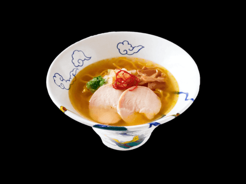 Ramen RAIJIN's Yuzu Shio Frozen Ramen with succulent chicken cha-shu in a citrus-infused broth, served in a traditional bowl