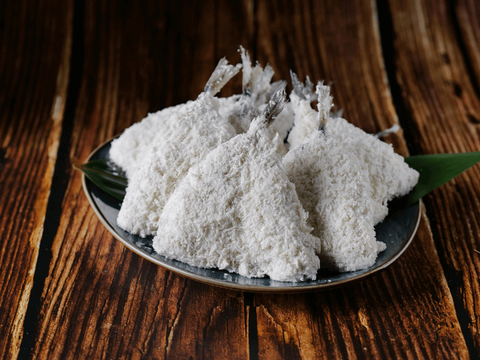 Breaded Aji Fry 60g - Prepared Horse mackerel on a leaf-lined plate, ready for frying, showcasing Japanese culinary tradition